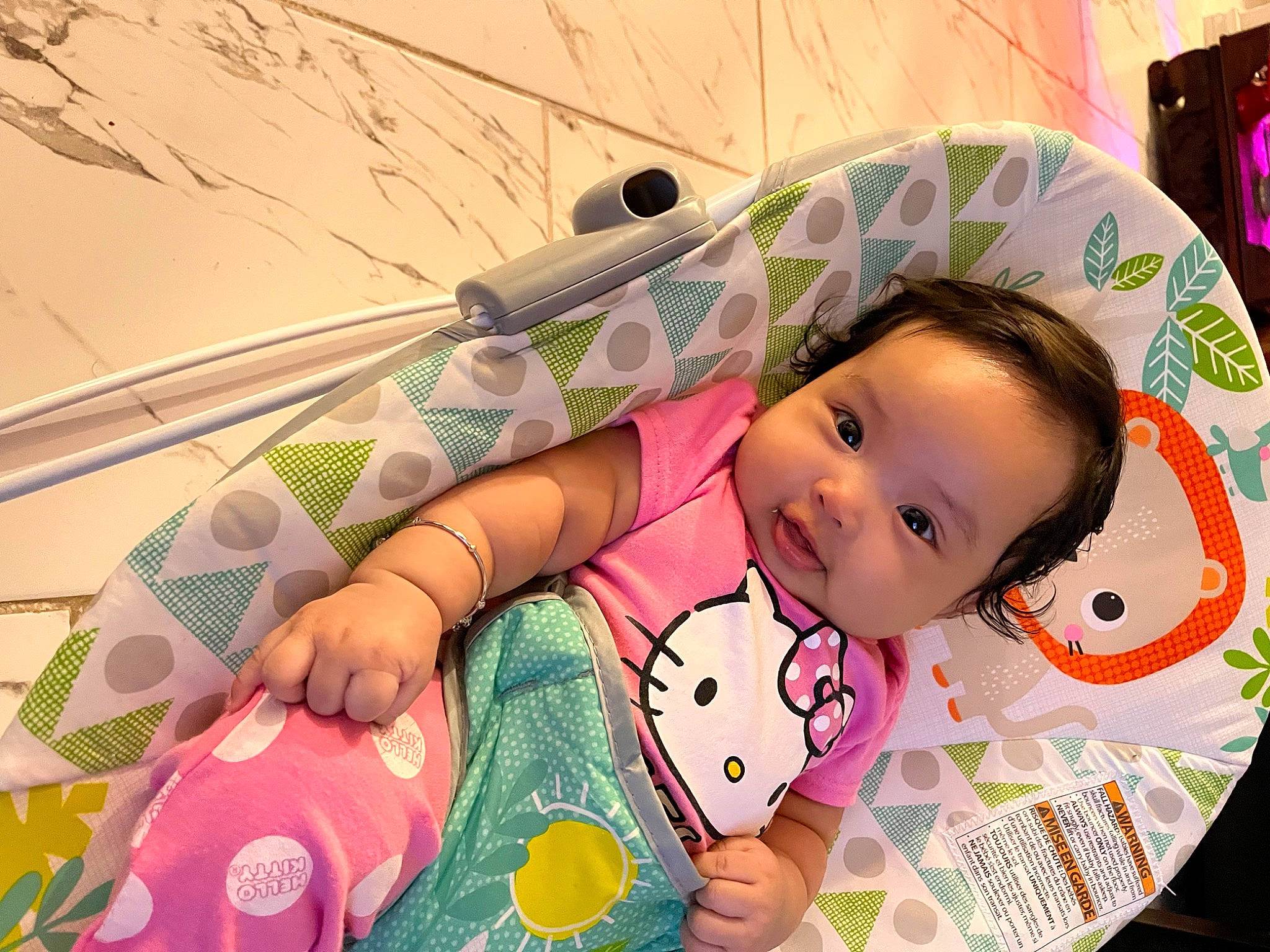 Miley is registered to the contest to win money with this photo: baby, baby_products, baby_toddler_clothing, baby_toys, cheek, child, circle, fun, grass, happy, linens, magenta, pattern, person, pink, play, room, skin, smile, textile