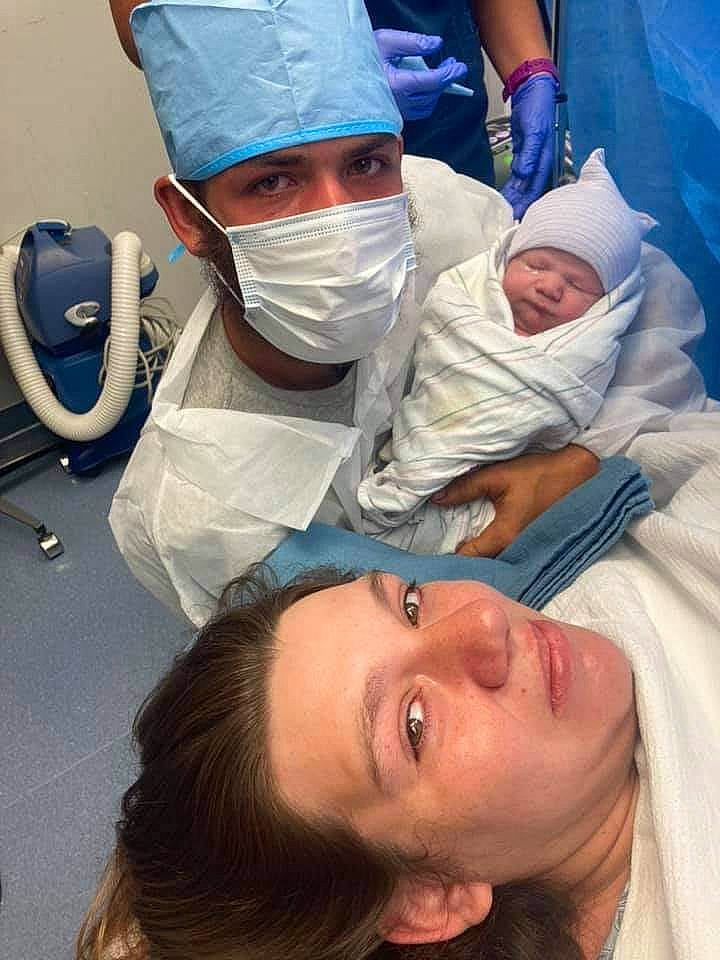 Houston is registered to the contest to win money with this photo: baby, child, comfort, event, eyelash, happy, headwear, health_care, health_care_provider, hospital, hospital_gown, medical, medical_procedure, mouth, nursing, operating_theater, patient, person, room, service