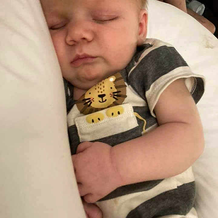 Houston is registered to the contest to win money with this photo: baby, baby_products, baby_toddler_clothing, bib, cheek, child, comfort, eye, eyelash, face, happy, head, iris, nail, nose, sitting, skin, t_shirt, thigh, toddler