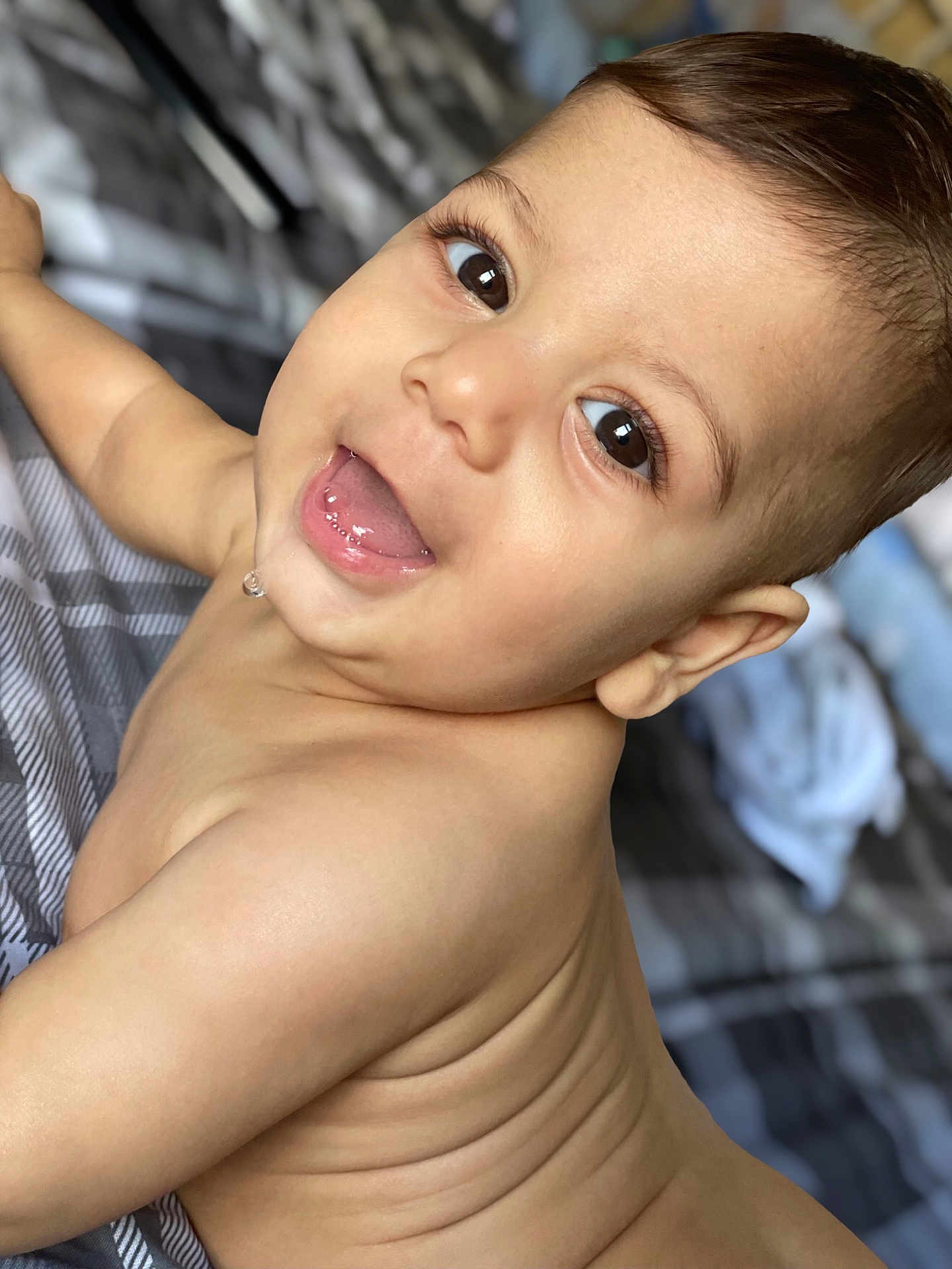 Matteo is registered to the contest to win money with this photo: baby, child, smiling, face, eyes, drool, skin, hair, bed, blanket, crawling, happy, cute, infant, portrait, closeup, indoors, young, person, expression