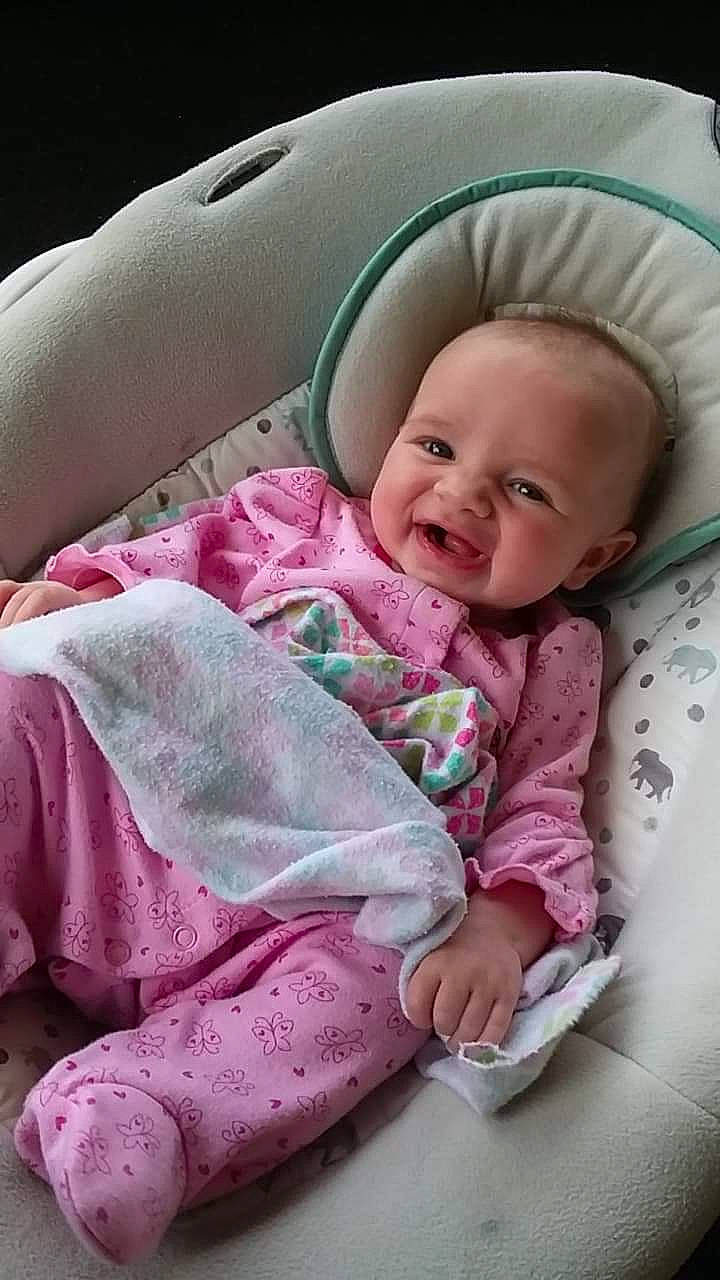 Cynthia is registered to the contest to win money with this photo: baby, baby_in_car_seat, baby_products, baby_sleeping, bedtime, birth, cheek, child, comfort, infant_bed, nap, person, pink, product, skin, sleep, textile, toddler