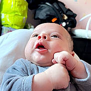 Sohan participe au concours pour gagner de l'argent avec cette photo : baby, baby_sleeping, baby_toddler_clothing, child, comfort, flash_photography, foot, fun, gesture, happy, linens, mouth, nail, plastic_bag, room, sitting, textile, thumb, toddler, yellow