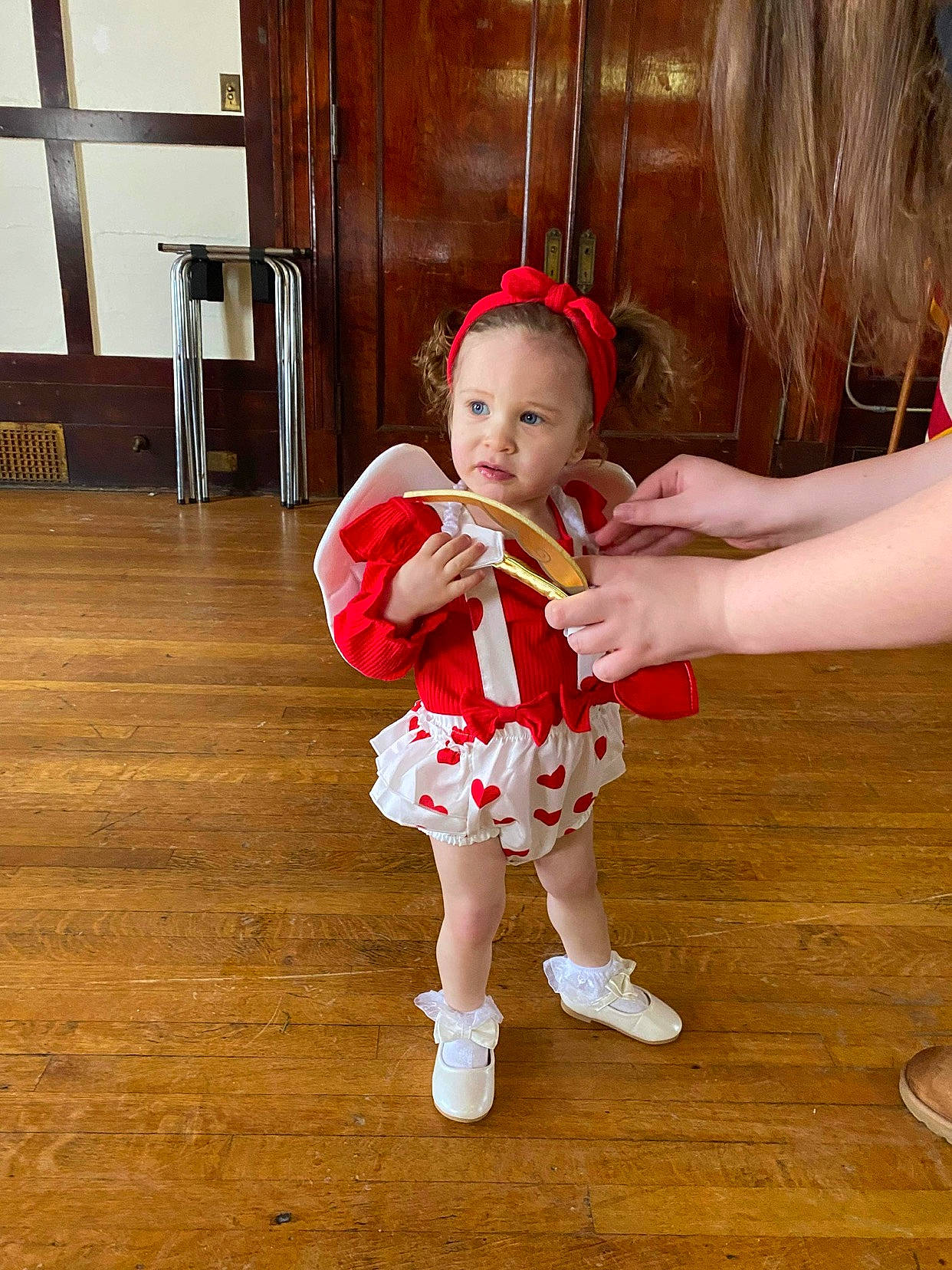 Vanessa is registered to the contest to win money with this photo: baby, baby_toddler_clothing, event, eye, floor, flooring, happy, hardwood, human_leg, laminate_flooring, party_supply, peach, person, skin, sleeve, sock, toddler, varnish, wood, wood_flooring