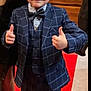 Isaac a rejoint le concours — aidez-le/la à gagner de superbes lots ! child, boy, suit, bow_tie, thumbs_up, red_carpet, formal_wear, smile, indoor, portrait, person, short_hair, checked_pattern, jacket, trousers, fashion, event, celebration, happy, cute