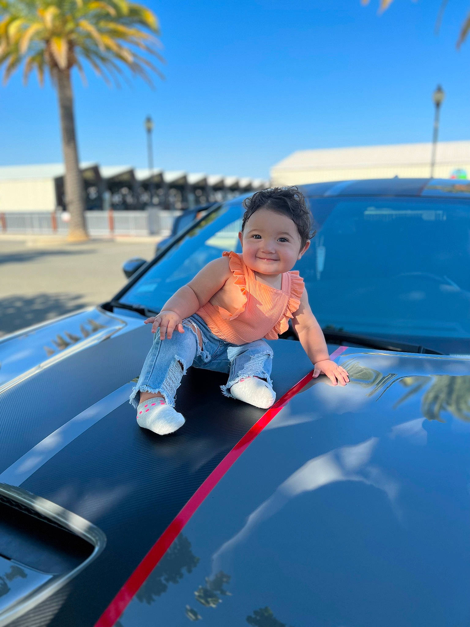 Alaia joined the competition — help win amazing prizes! automotive_design, automotive_exterior, automotive_lighting, azure, bumper, car, fender, glass, grille, headlamp, hood, joy, mode_of_transport, motor_vehicle, person, personal_luxury_car, sky, summer, toddler, vehicle