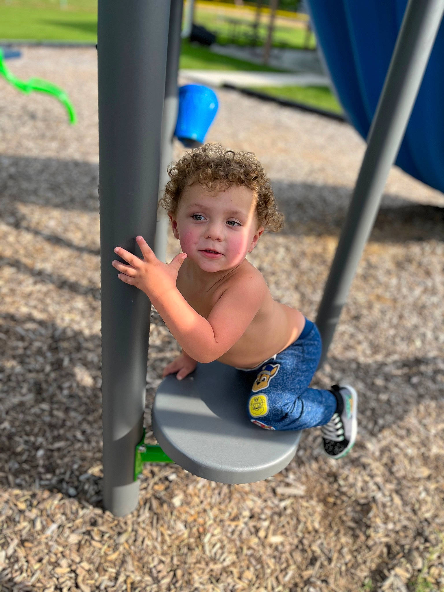 Quinten joined the competition — help win amazing prizes! baby, blue, child, city, electric_blue, fun, grass, green, leisure, outdoor_play_equipment, people_in_nature, person, play, playground, recreation, shade, soil, swing, thigh, toddler
