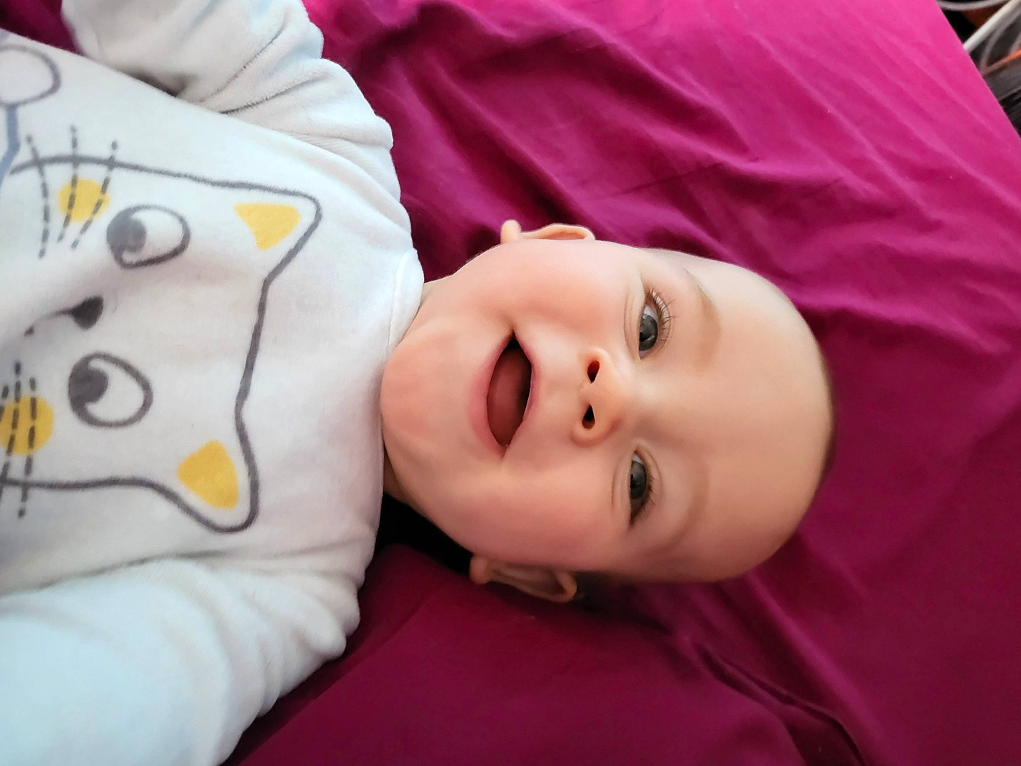 Louis participe au concours pour gagner de l'argent avec cette photo : baby, baby_toddler_clothing, beauty, cheek, child, comfort, eyelash, fun, happy, linens, lip, magenta, nose, person, pink, portrait_photography, skin, sleeve, smile, textile