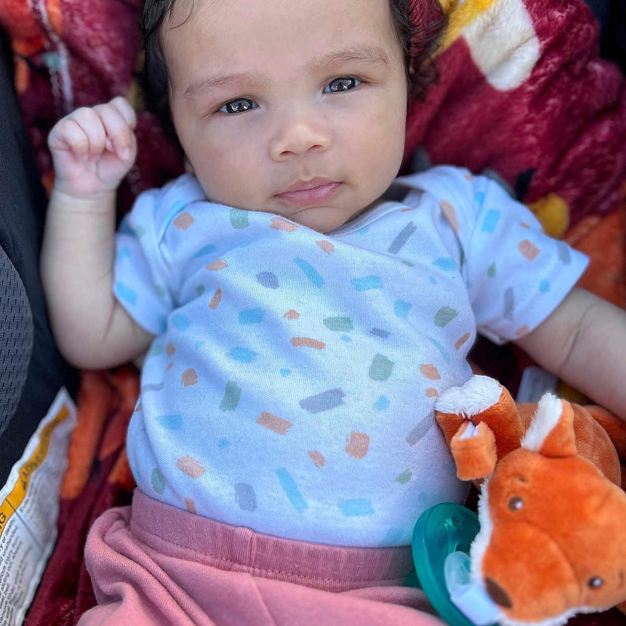 Jeslyn is registered to the contest to win money with this photo: baby, blanket, clothing, couch, cushion, face, furniture, happy, head, homedecor, newborn, person, photography, plush, portrait, quilt, sleeping, smile, t_shirt, toy