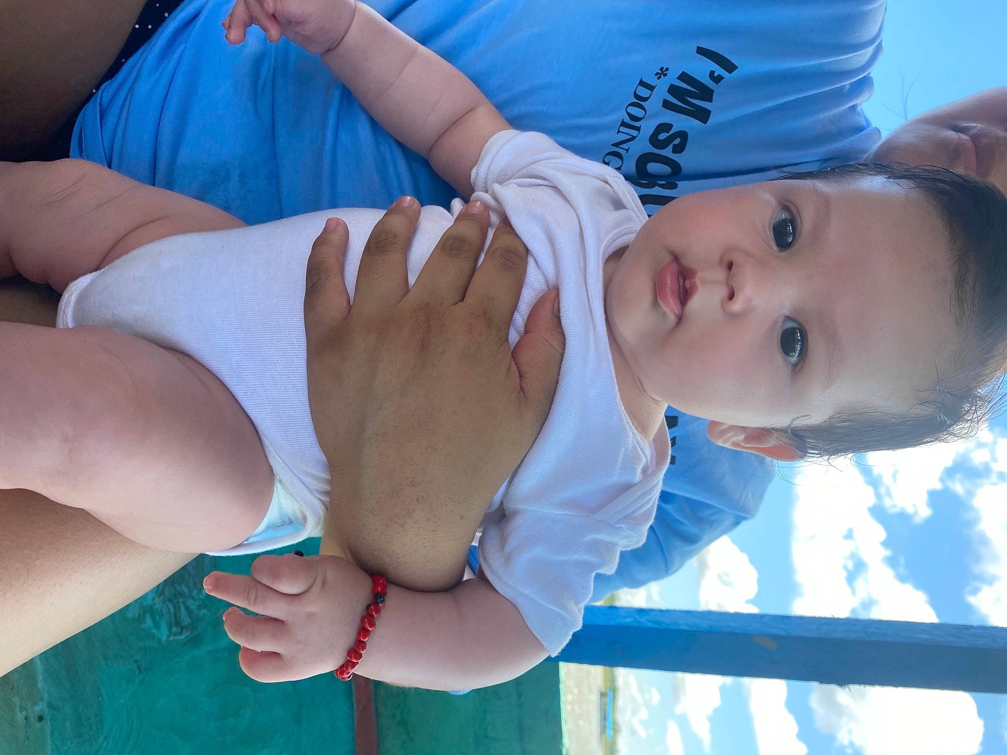Albert is registered to the contest to win money with this photo: arm, azure, baby, blue, child, elbow, finger, gesture, hand, happy, joint, leisure, nail, person, plant, skin, stomach, thigh, thumb, toddler