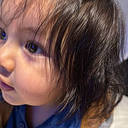 Reivax Alfonso is registered to the contest to win money with this photo: blue_shirt, candid, cheek, child, closeup, collar, curious_expression, eyelashes, eyes, face, hoodie, indoor, jacket, long_hair, messy_hair, ponytail, portrait, profile_view, soft_skin, toddler