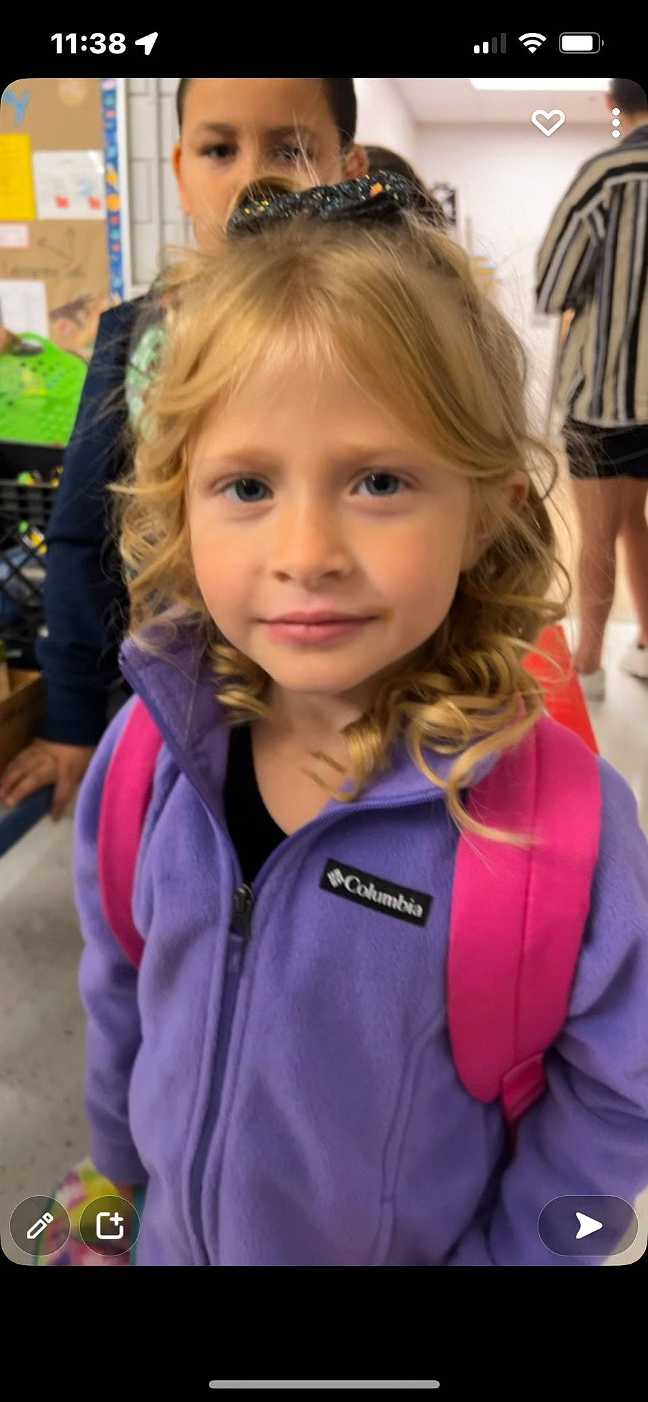 Olivia Cleghorn is registered to the contest to win money with this photo: bag, blond, brown_hair, child, clothing, electric_blue, event, fashion_accessory, fun, happy, iris, joy, leisure, long_hair, luggage_and_bags, person, plant, recreation, shorts, smile