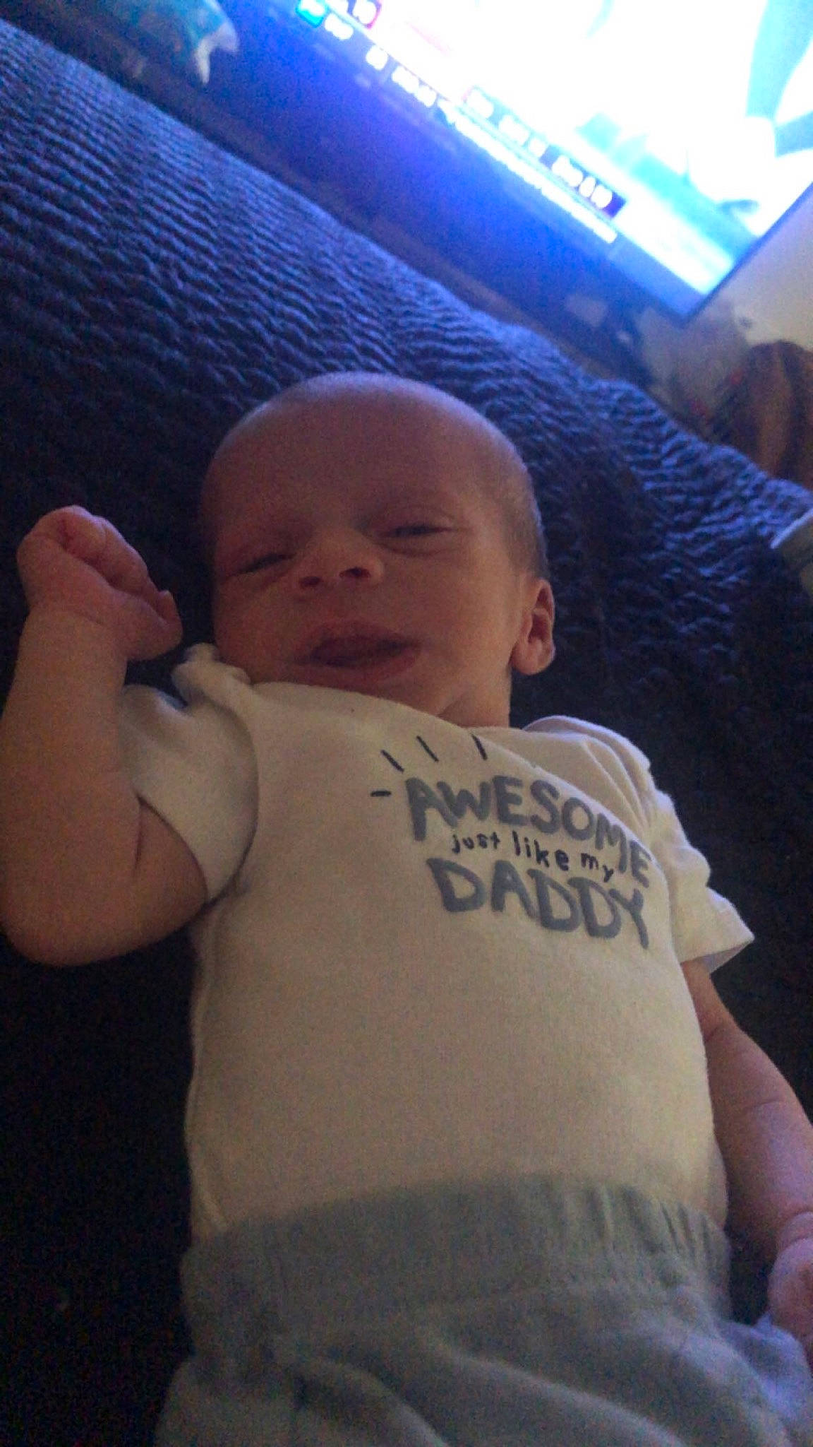 Ezrah is registered to the contest to win money with this photo: arm, baby, blue, cheek, chin, comfort, cool, eyebrow, finger, forehead, hair, hairstyle, hand, human_body, iris, mouth, muscle, nose, person, skin