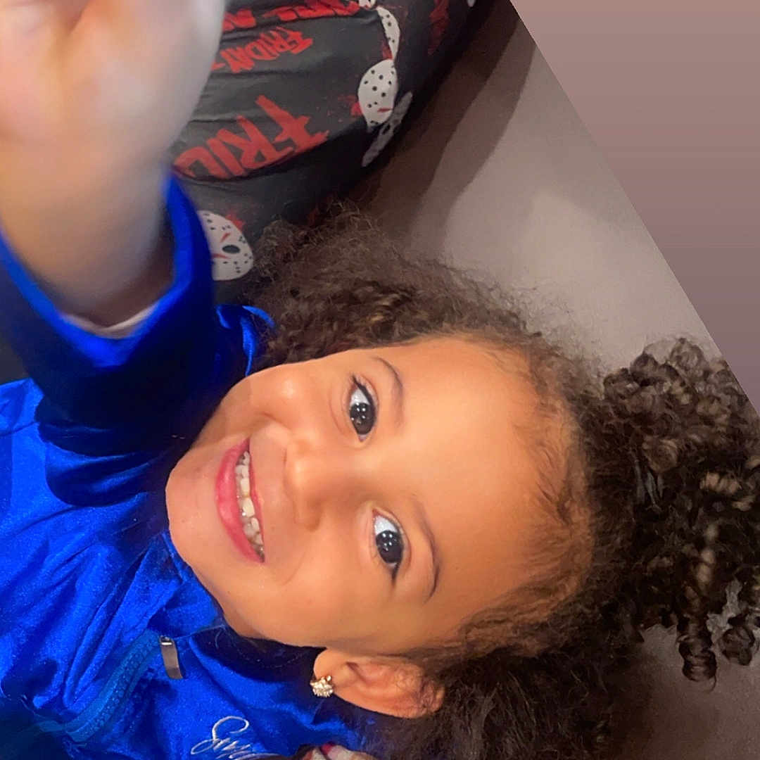 Kaniya is registered to the contest to win money with this photo: bodypart, child, clothing, dress, face, female, finger, girl, hair, hand, happy, head, mouth, person, photography, portrait, selfie, smile, t_shirt, teeth