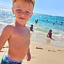 Inohé a rejoint le concours — aidez-le/la à gagner de superbes lots ! child, boy, beach, ocean, water, sand, sunny, swim_trunks, cap, summer, waves, playing, smiling, holiday, outdoor, vacation, sea, people, kids, shore
