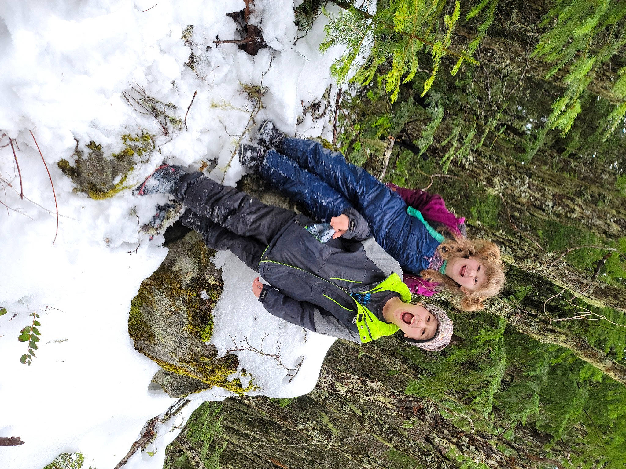 Levii is registered to the contest to win money with this photo: adventure, conifer, fir, forest, freezing, glove, headwear, hiking, ice_cap, joy, outdoor_shoe, people_in_nature, person, snow, winter