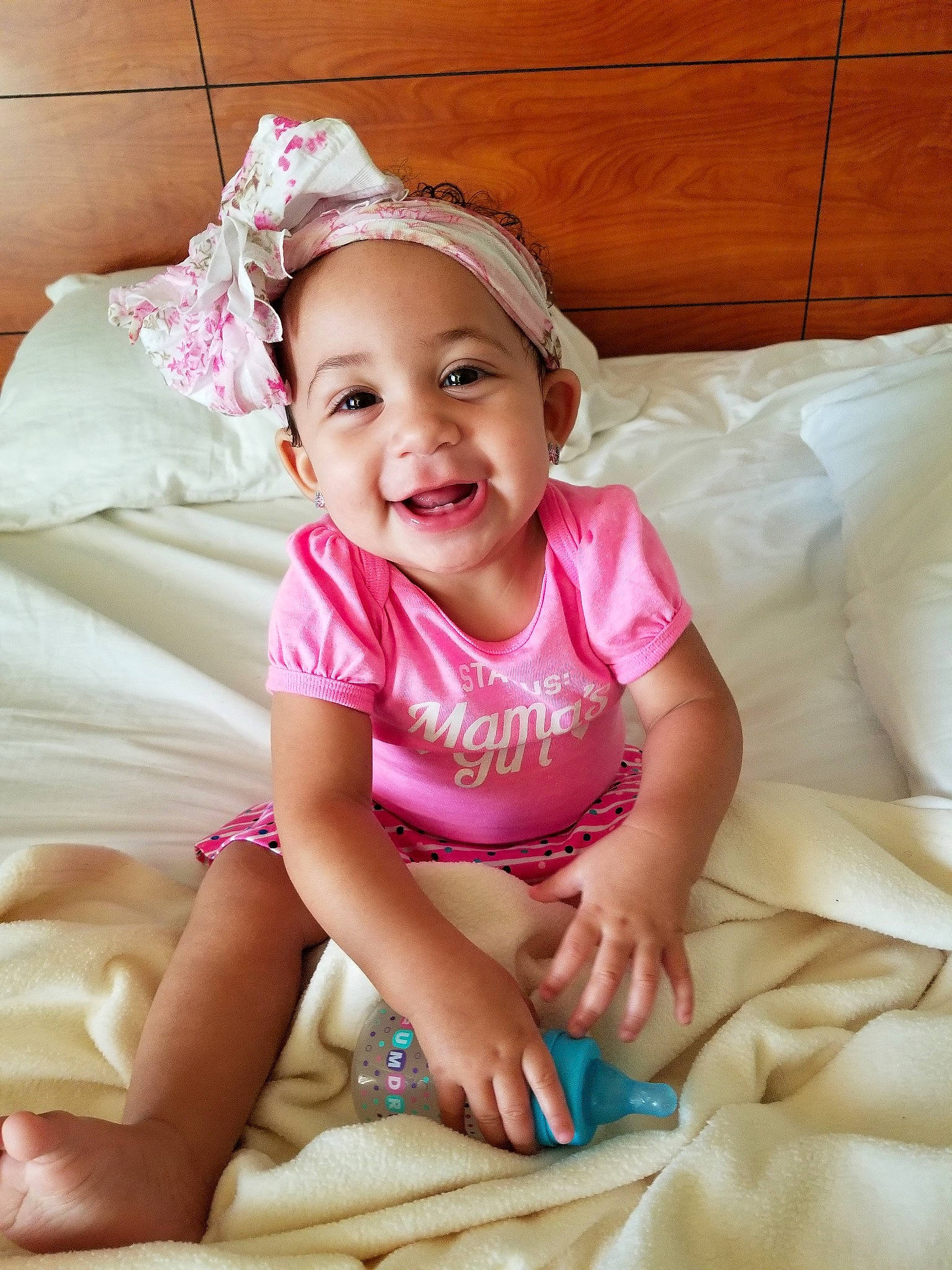 Larissa is registered to the contest to win money with this photo: beauty, child, child_model, girl, hair_accessory, happiness, headgear, infant, leg, person, pink, product, sitting, skin, smile, textile, toddler