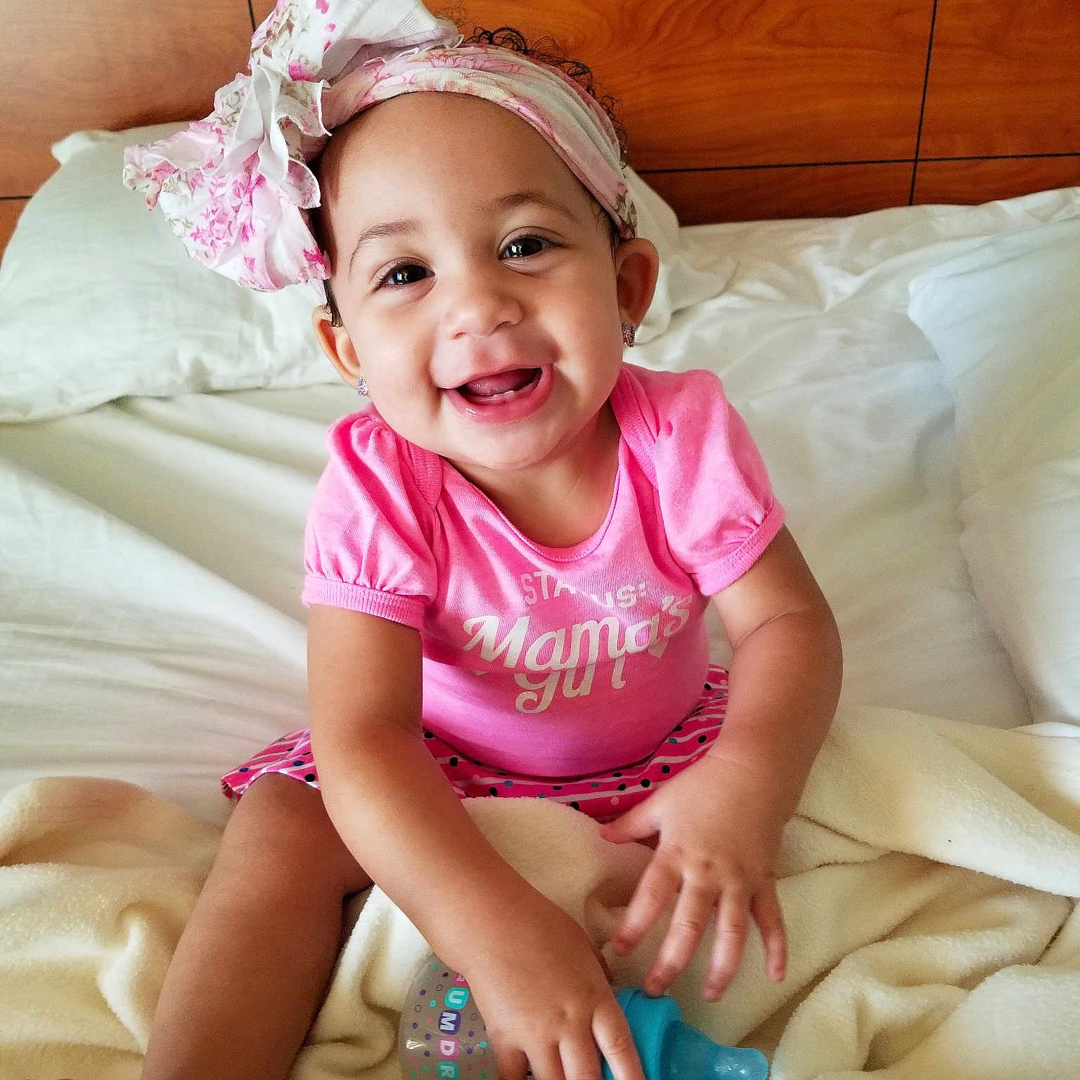 Larissa is registered to the contest to win money with this photo: beauty, child, child_model, girl, hair_accessory, happiness, headgear, infant, leg, person, pink, product, sitting, skin, smile, textile, toddler