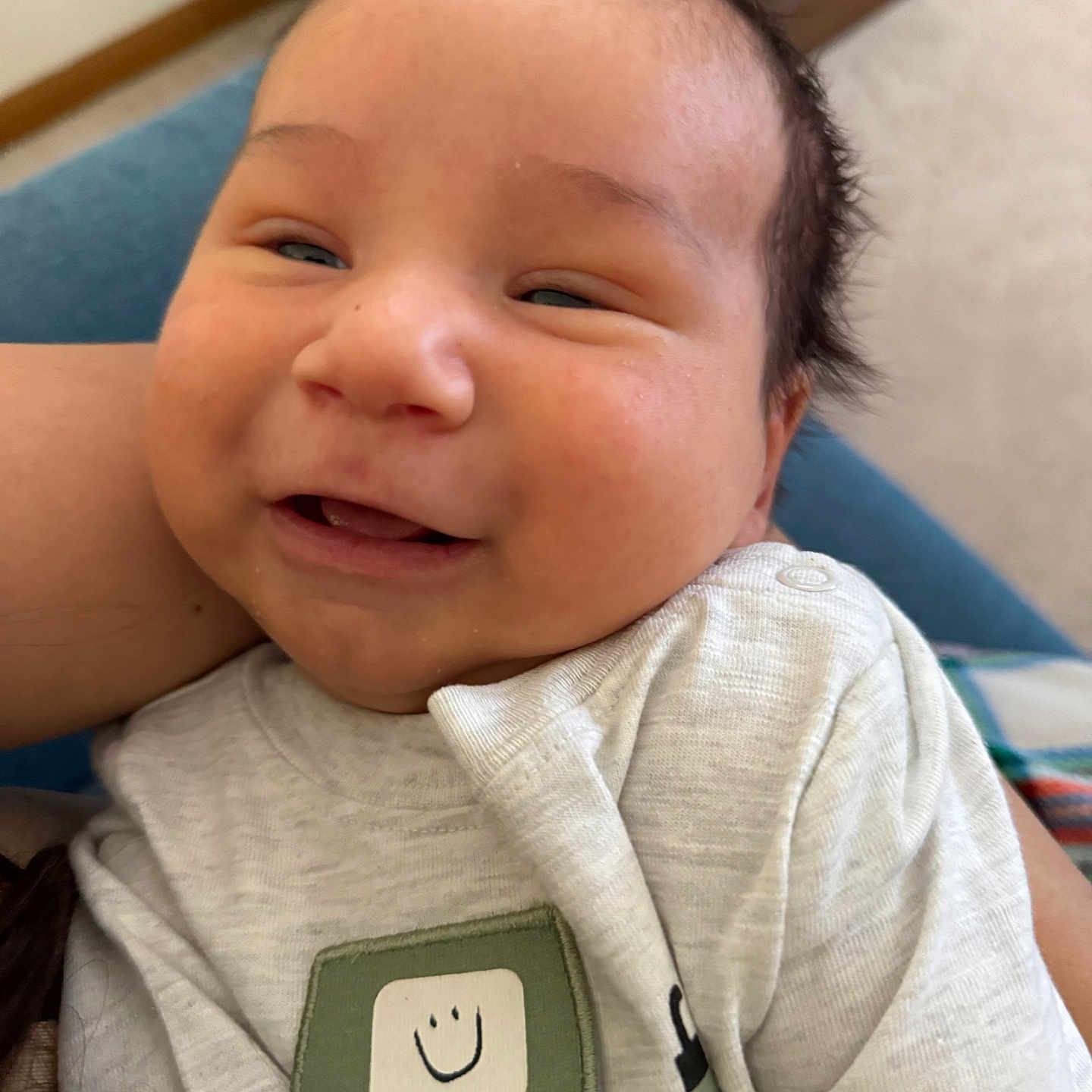 Bricen joined the competition — help win amazing prizes! baby, casual, cheeks, child, closeup, clothing, cute, expression, face, hair, happy, holding, indoor, infant, patch, person, portrait, shirt, skin, smile