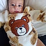 animal, baby, bear, blanket, bodypart, couch, cushion, face, finger, furniture, hand, head, homedecor, newborn, person, photography, pillow, plush, portrait, toy