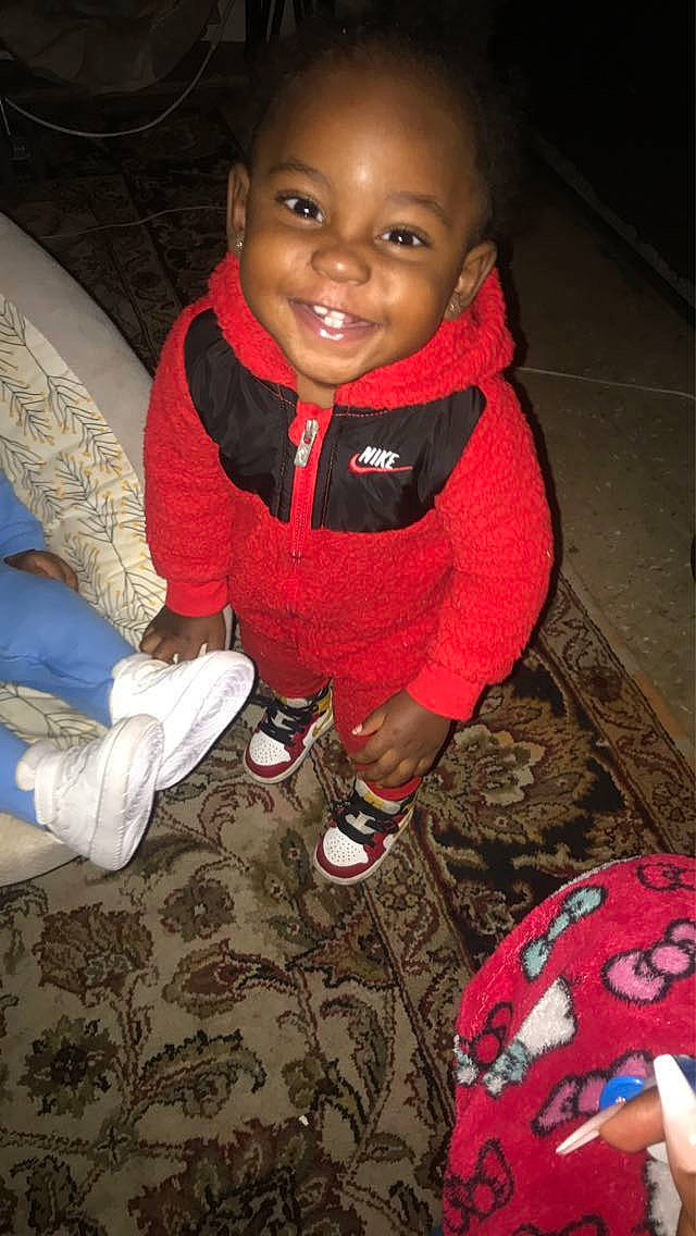 Kingston is registered to the contest to win money with this photo: baby, baby_toddler_clothing, carmine, cheek, comfort, cool, flash_photography, floor, flooring, fun, grass, happy, joy, nose, people, person, red, sleeve, smile, sneakers