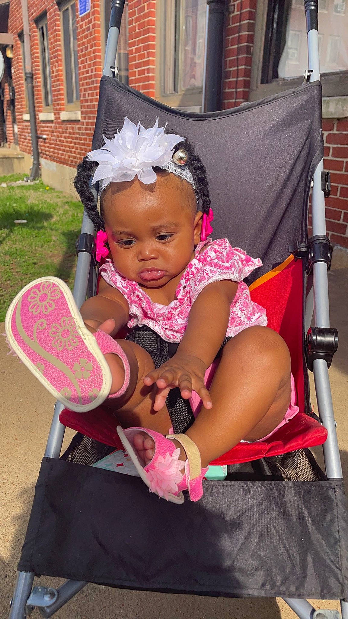 Khalani is registered to the contest to win money with this photo: baby, baby_products, baby_toddler_clothing, child, event, fashion_accessory, fun, happy, hat, jewellery, leisure, magenta, person, pink, recreation, sandal, sitting, sock, thigh, toddler