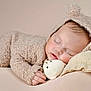 Neil Rafael is registered to the contest to win money with this photo: adorable, baby, bear_ears, blanket, child, clothing, costume, cozy, cute, face, hand, indoors, infant, newborn, peaceful, plush_toy, portrait, resting, sleeping, soft_texture