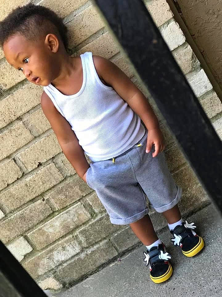 Dj is registered to the contest to win money with this photo: child, cool, denim, footwear, jeans, leg, person, photography, recreation, shoe, standing, street_fashion, surprise, t_shirt