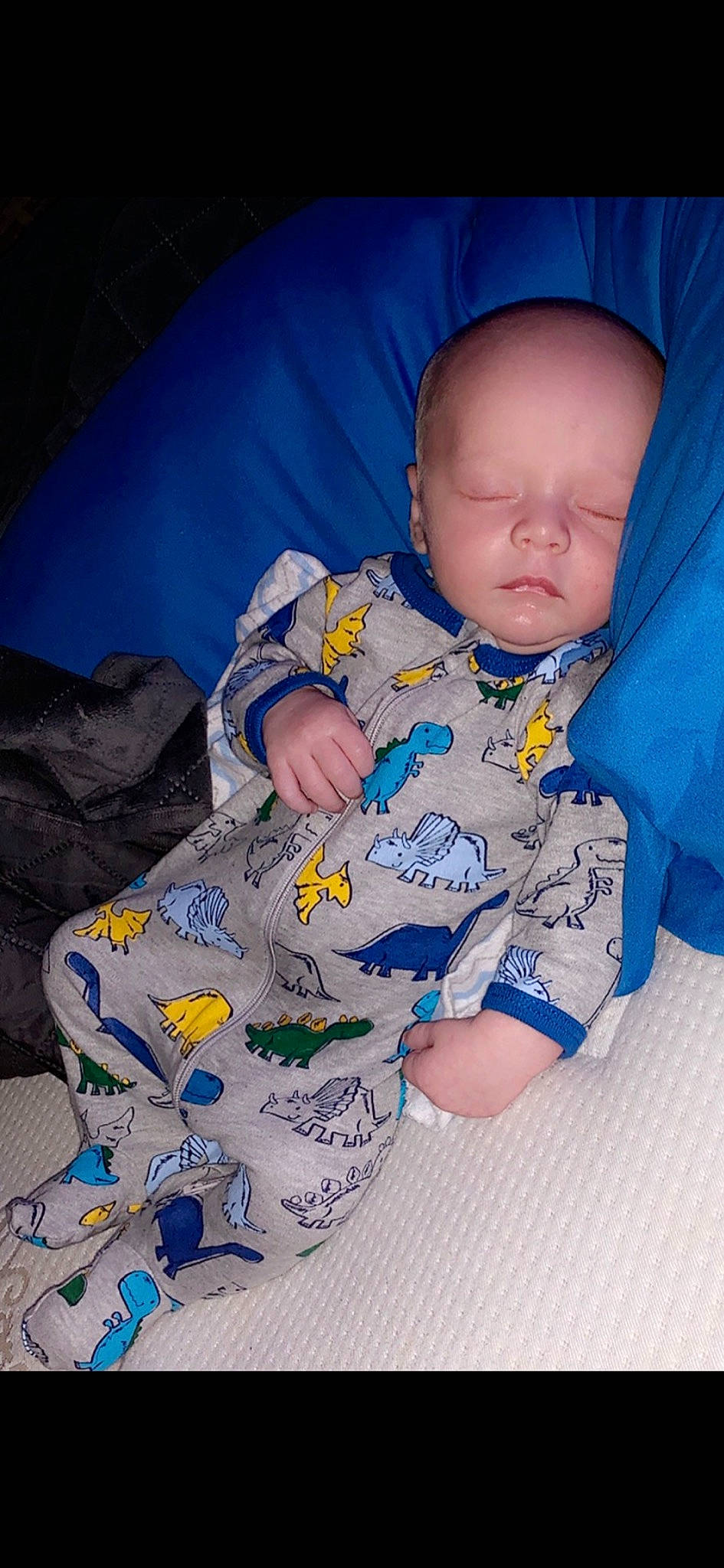 Kooper is registered to the contest to win money with this photo: baby, baby_products, baby_toddler_clothing, blue, child, person, product, sitting, sleep, toddler