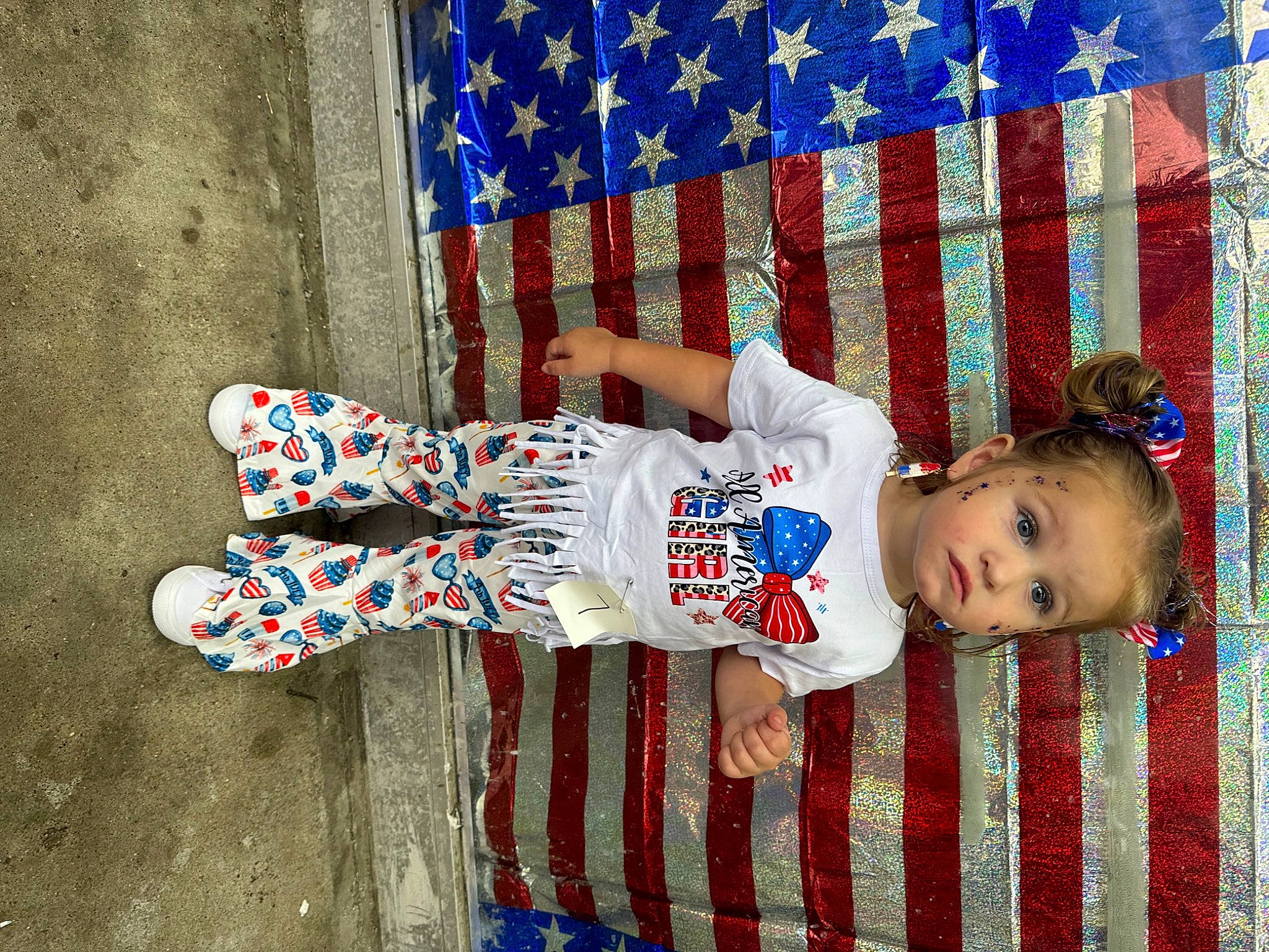 Sophie joined the competition — help win amazing prizes! baby_toddler_clothing, blue, carmine, child, electric_blue, event, flag_of_the_united_states, fun, happy, holiday, human_leg, line, pattern, person, plant, red, sleeve, smile, toddler, tree