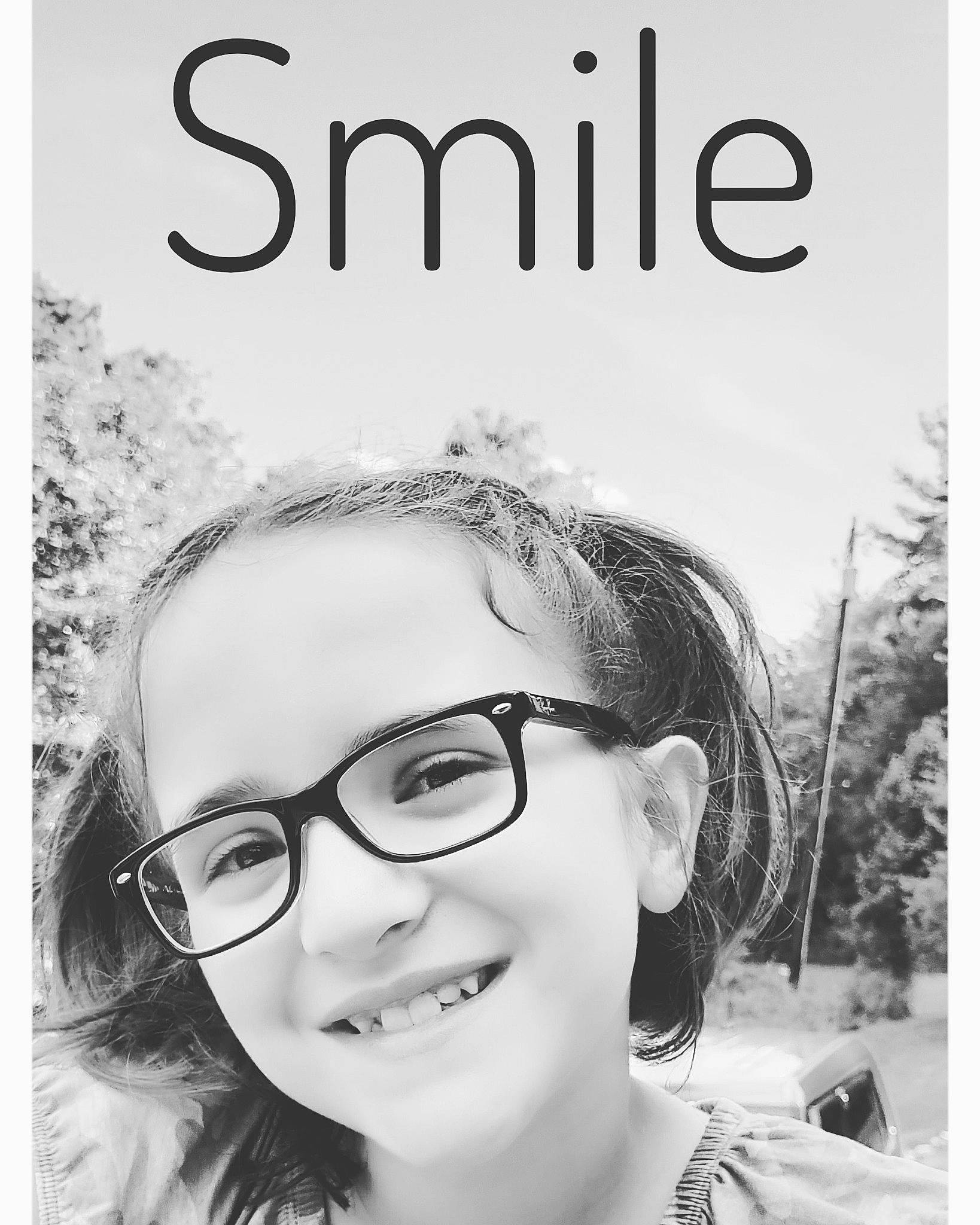 Jada joined the competition — help win amazing prizes! black_and_white, chin, eyebrow, eyelash, eyewear, facial_expression, flash_photography, font, forehead, glasses, happy, human, jaw, joy, lip, nose, person, publication, smile, style