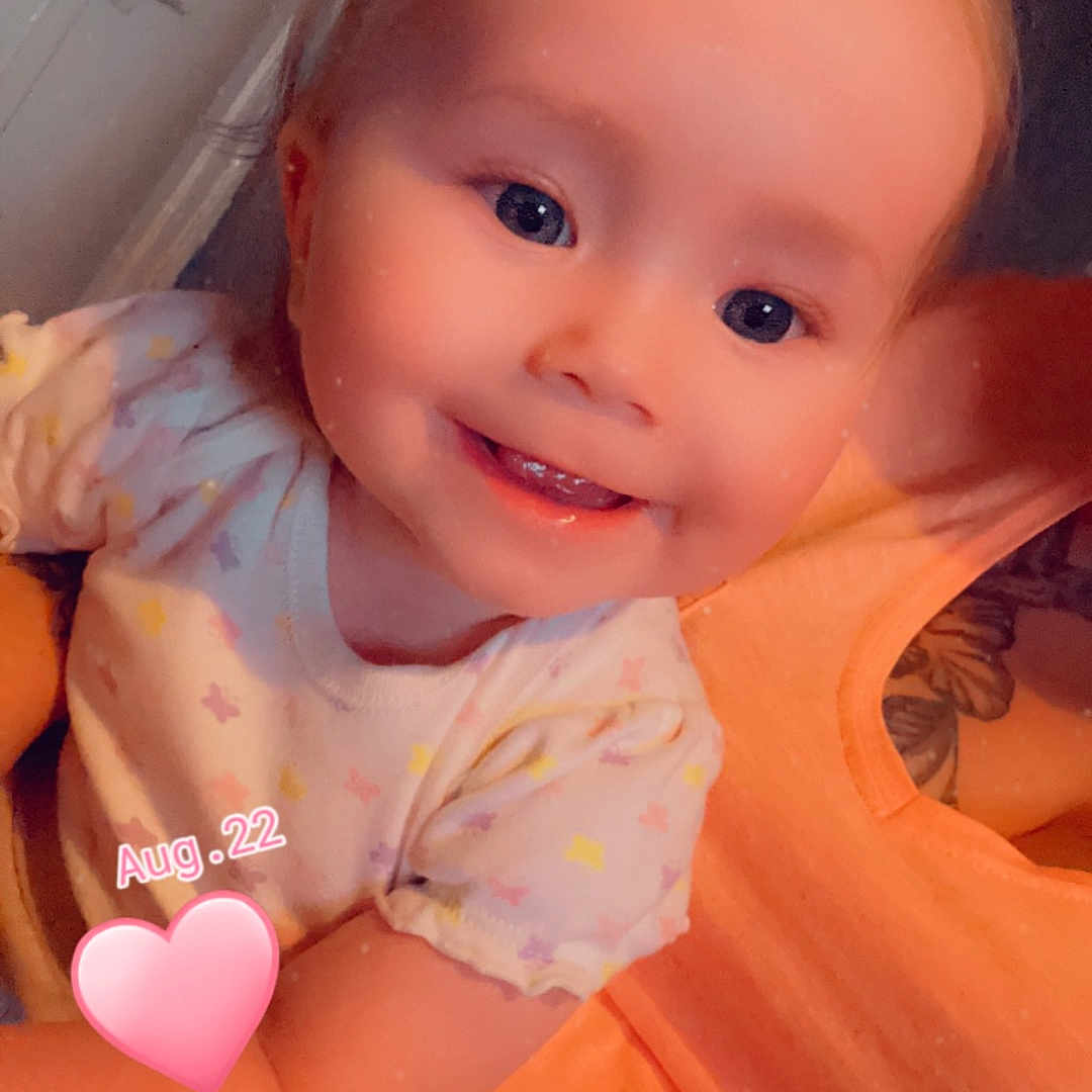 Ivy-Rose is registered to the contest to win money with this photo: baby, balloon, bodypart, clothing, couch, cushion, face, finger, furniture, hand, happy, head, heart, homedecor, person, photography, portrait, sitting, smile, t_shirt