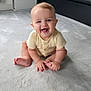 baby, smiling, indoor, carpet, child, happy, sitting, person, face, cute, young, infant, furniture, modern, floor, clothing, short_sleeve, skin, toe, hand