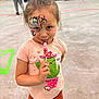 Stella joined the competition — help win amazing prizes! background, cactus, candy, casual, child, colorful, event, face_paint, floor, fun, holding, indoor, lollipop, people, playful, shirt, skirt, smiling, standing, young