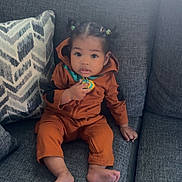 Melina joined the competition — help win amazing prizes! architecture, baby, bodypart, building, clothing, couch, cushion, face, finger, furniture, head, homedecor, indoors, livingroom, pants, person, photography, portrait, room, sitting