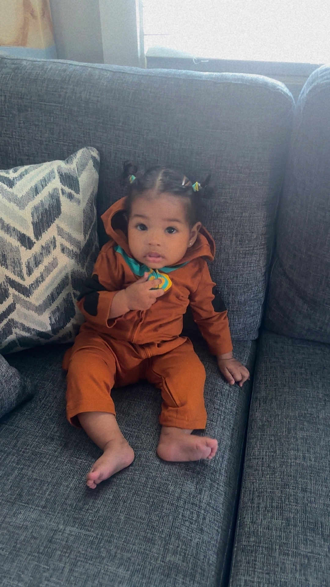 Melina joined the competition — help win amazing prizes! architecture, baby, bodypart, building, clothing, couch, cushion, face, finger, furniture, head, homedecor, indoors, livingroom, pants, person, photography, portrait, room, sitting
