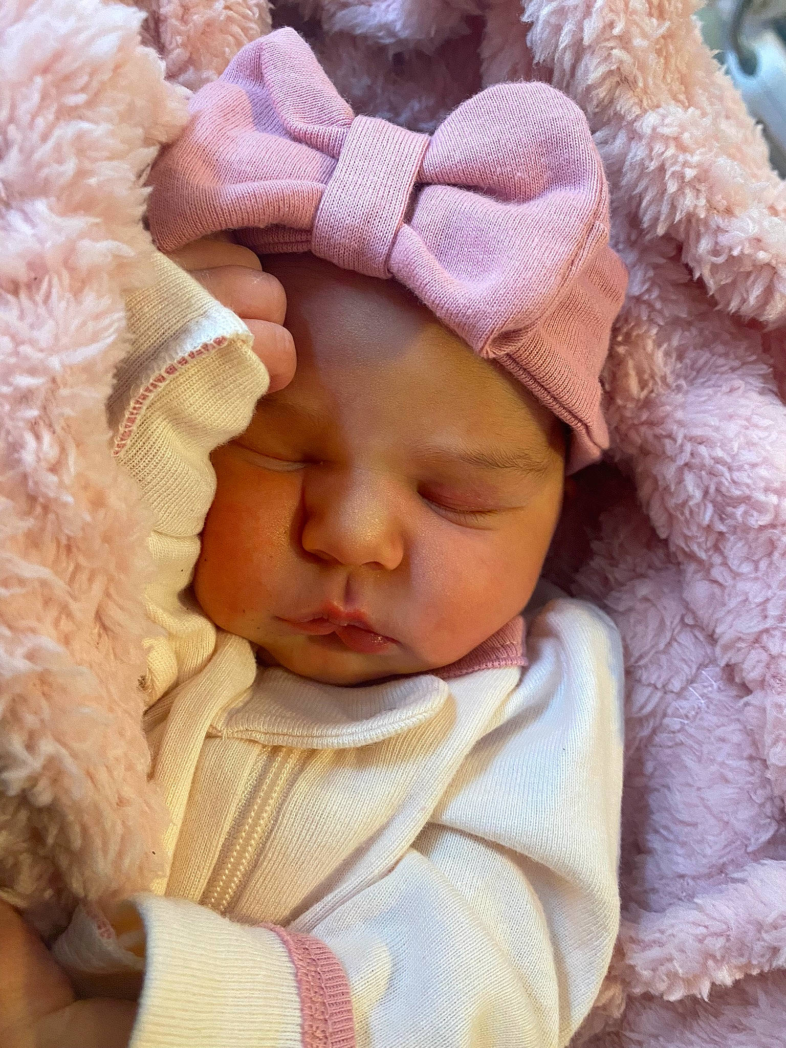 Adalynne is registered to the contest to win money with this photo: baby, baby_sleeping, baby_toddler_clothing, beige, cap, cheek, chin, comfort, eyelash, finger, headgear, headwear, knit_cap, linens, lip, person, pink, skin, sleeve, textile