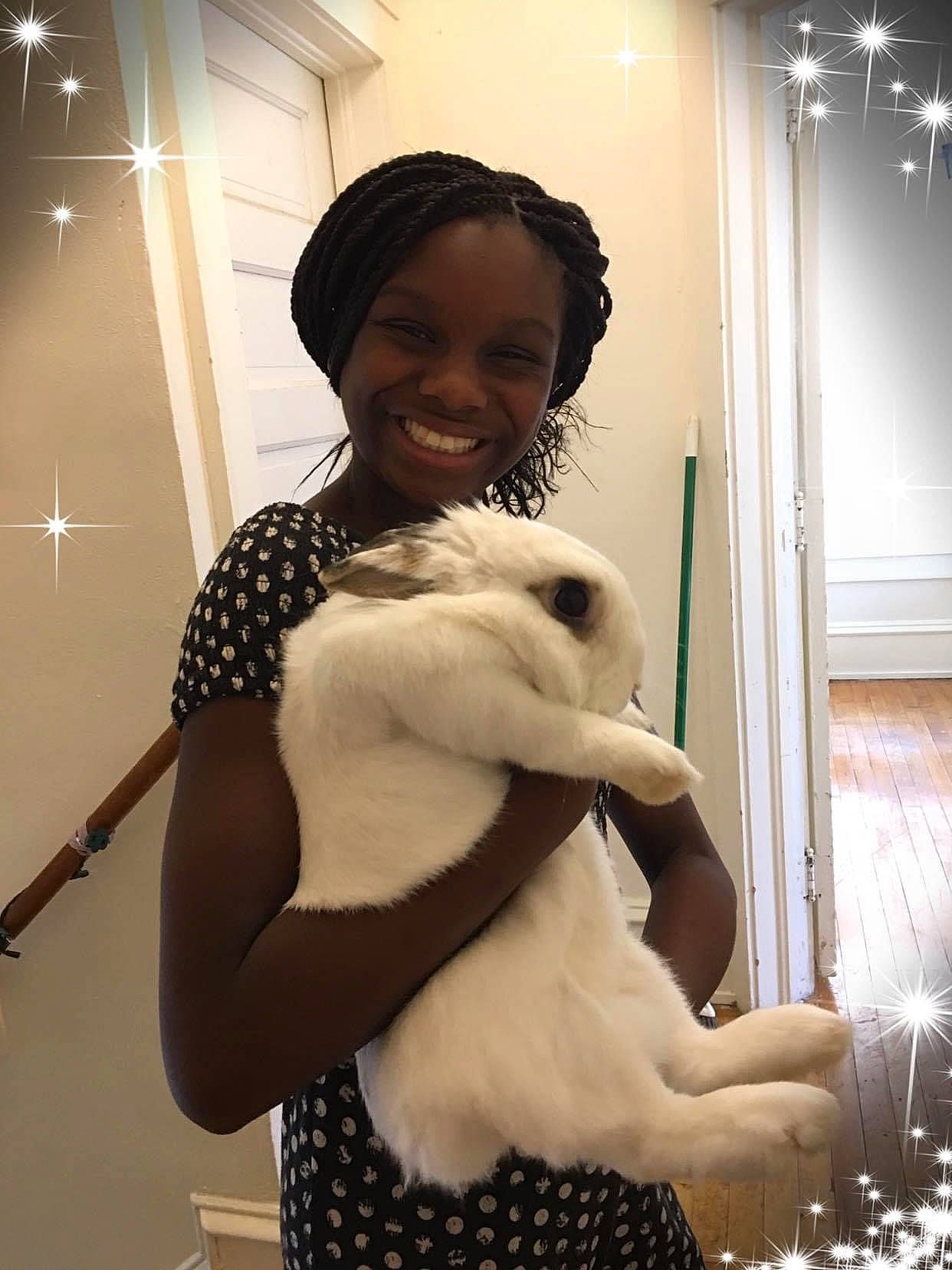 Norijah is registered to the contest to win money with this photo: companion_dog, dog_breed, fur, joy, person, pet_supply, plush, polka_dot, stuffed_toy, toy, window_treatment