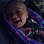 Alayia May-Belle joined the competition — help win amazing prizes! baby, infant, smiling, blanket, purple_blanket, floral_clothing, face, portrait, child, wrapped, cozy, happy, indoors, soft_texture, closeup, cute, person, head, infancy, warm