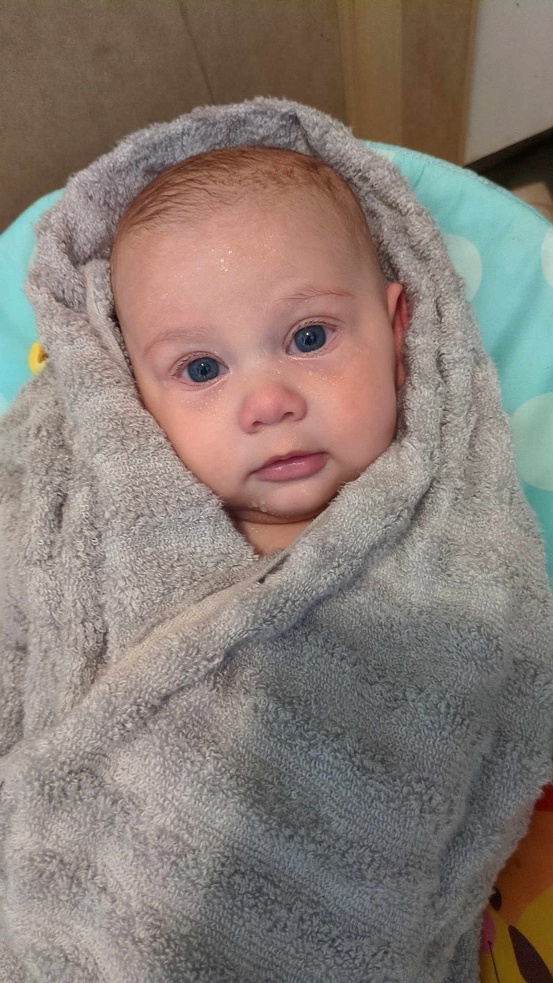 Alayia May-Belle joined the competition — help win amazing prizes! baby, towel, blue_eyes, wet_skin, close_up, infant, face, portrait, cute, child, wrapped, soft_texture, indoor, fresh, adorable, looking, skin, head, expression, newborn
