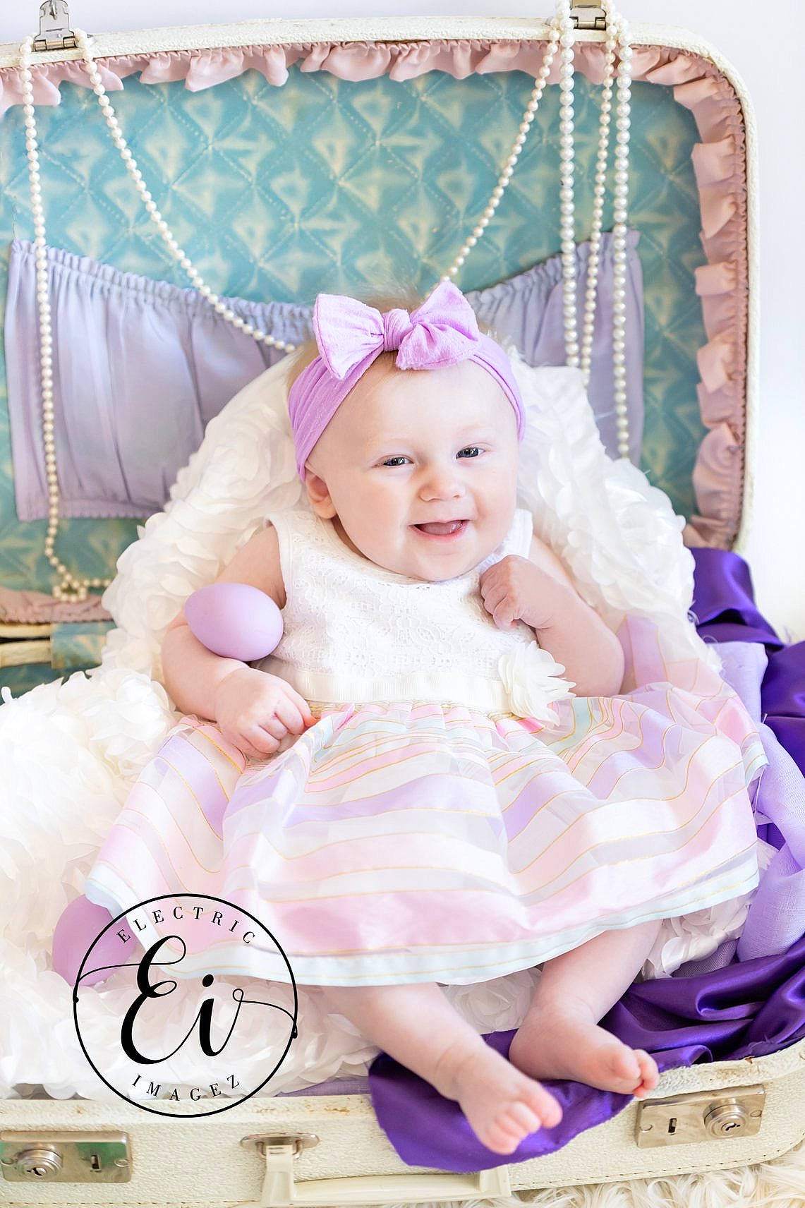 Danica joined the competition — help win amazing prizes! baby, baby_products, bed, child, furniture, happy, infant_bed, lavender, person, photograph, pink, product, purple, room, smile, toddler