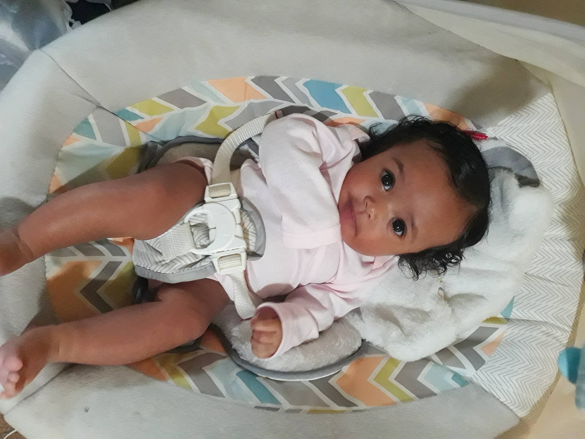 Tiana is registered to the contest to win money with this photo: baby, baby_carriage, baby_products, baby_safety, baby_sleeping, baby_toddler_clothing, baby_toys, bib, cheek, child, comfort, infant_bed, linens, person, product, room, sitting, skin, sleeve, toddler