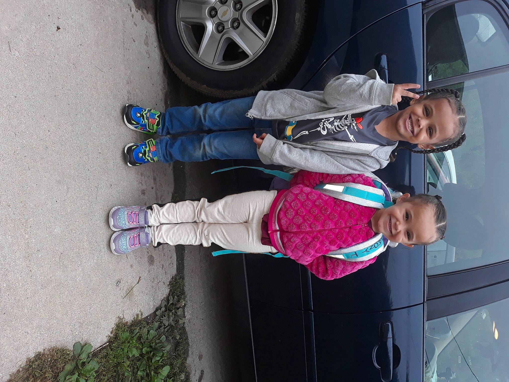 Harmony joined the competition — help win amazing prizes! automotive_lighting, automotive_tire, car, clothing, fender, footwear, hat, joy, light, motor_vehicle, outdoor_shoe, person, plant, shoe, smile, sneakers, tire, vehicle, vehicle_door, walking_shoe