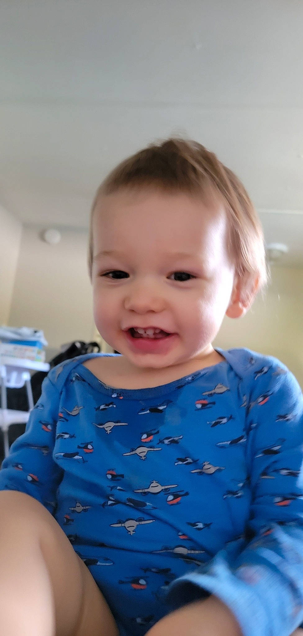 Alexander is registered to the contest to win money with this photo: baby, baby_toddler_clothing, chair, cheek, chin, collar, dress, face, facial_expression, happy, human_body, iris, joy, lip, neck, nose, person, skin, sleeve, smile