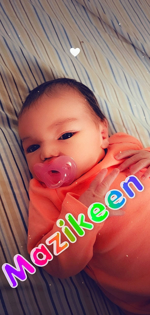 Mazikeen is registered to the contest to win money with this photo: baby, baby_toddler_clothing, cheek, chin, eye, eyebrow, eyelash, face, facial_expression, finger, flash_photography, fun, happy, head, iris, lip, mouth, nose, person, skin