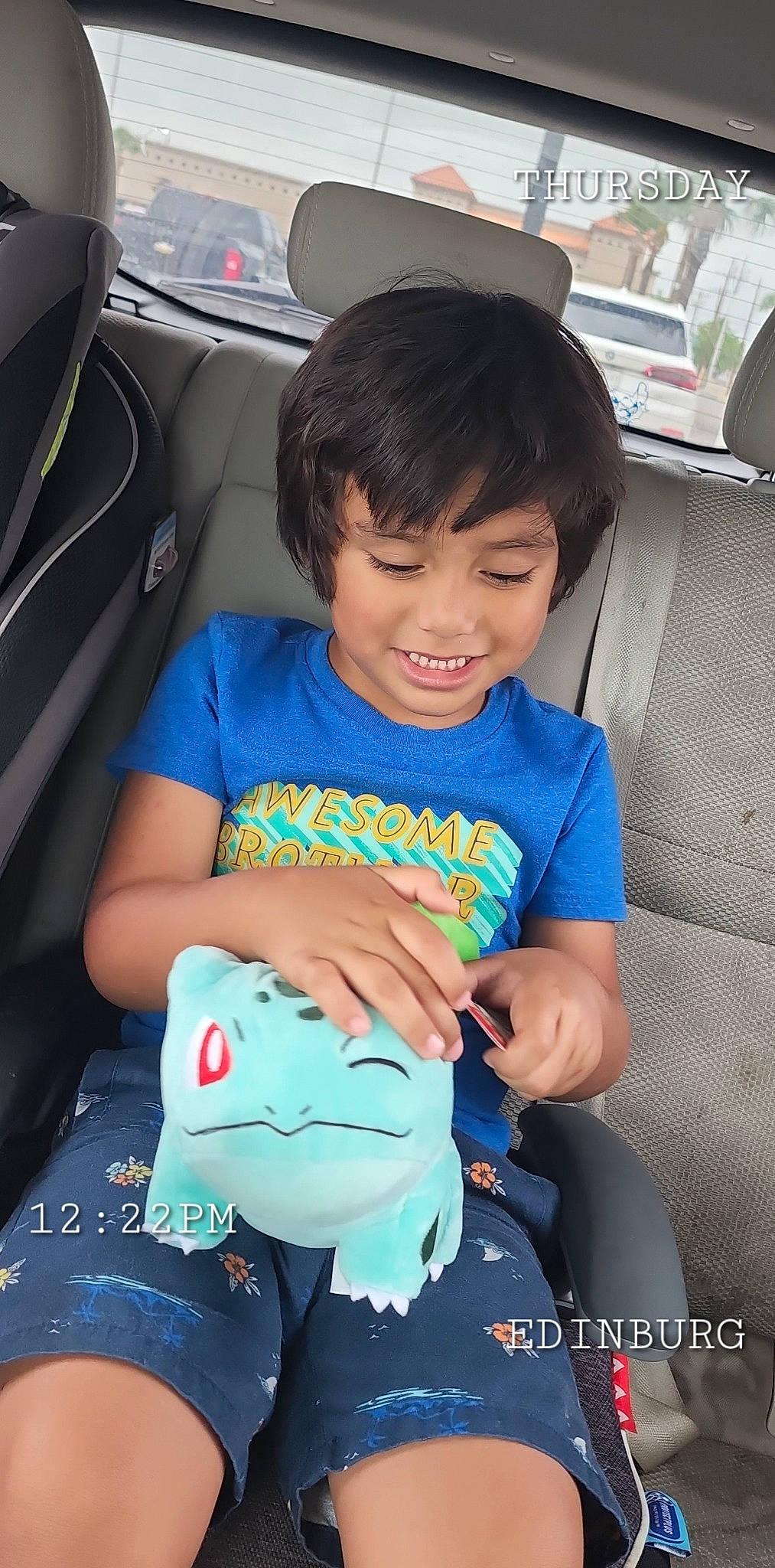 Jacob is registered to the contest to win money with this photo: auto_part, automotive_design, blue, car, car_seat, car_seat_cover, comfort, finger, happy, head_restraint, joy, lap, motor_vehicle, mouth, person, personal_luxury_car, product, skin, smile, steering_wheel