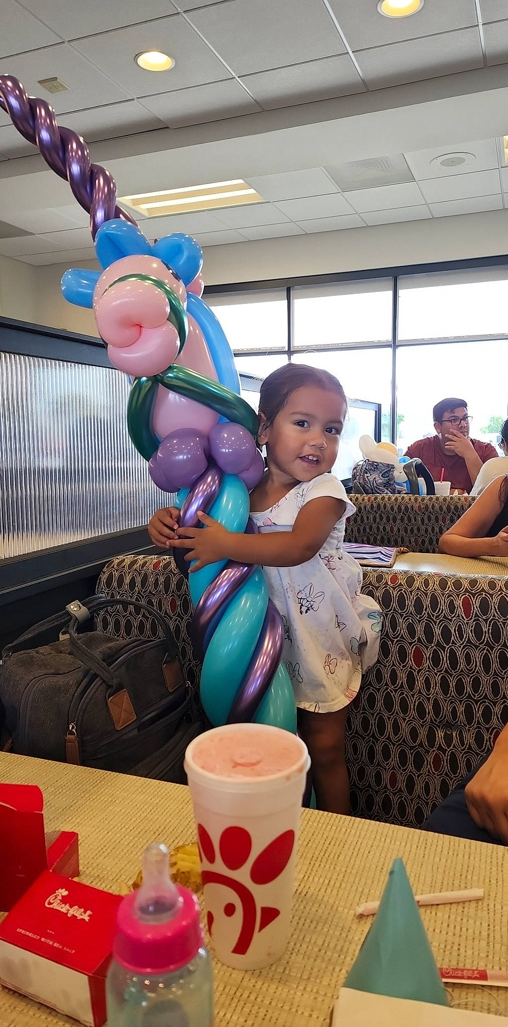 Jacklyn joined the competition — help win amazing prizes! chair, child, community, cup, event, fun, happy, hat, leisure, person, photograph, pink, purple, recreation, smile, snapshot, t_shirt, table, tableware, toddler