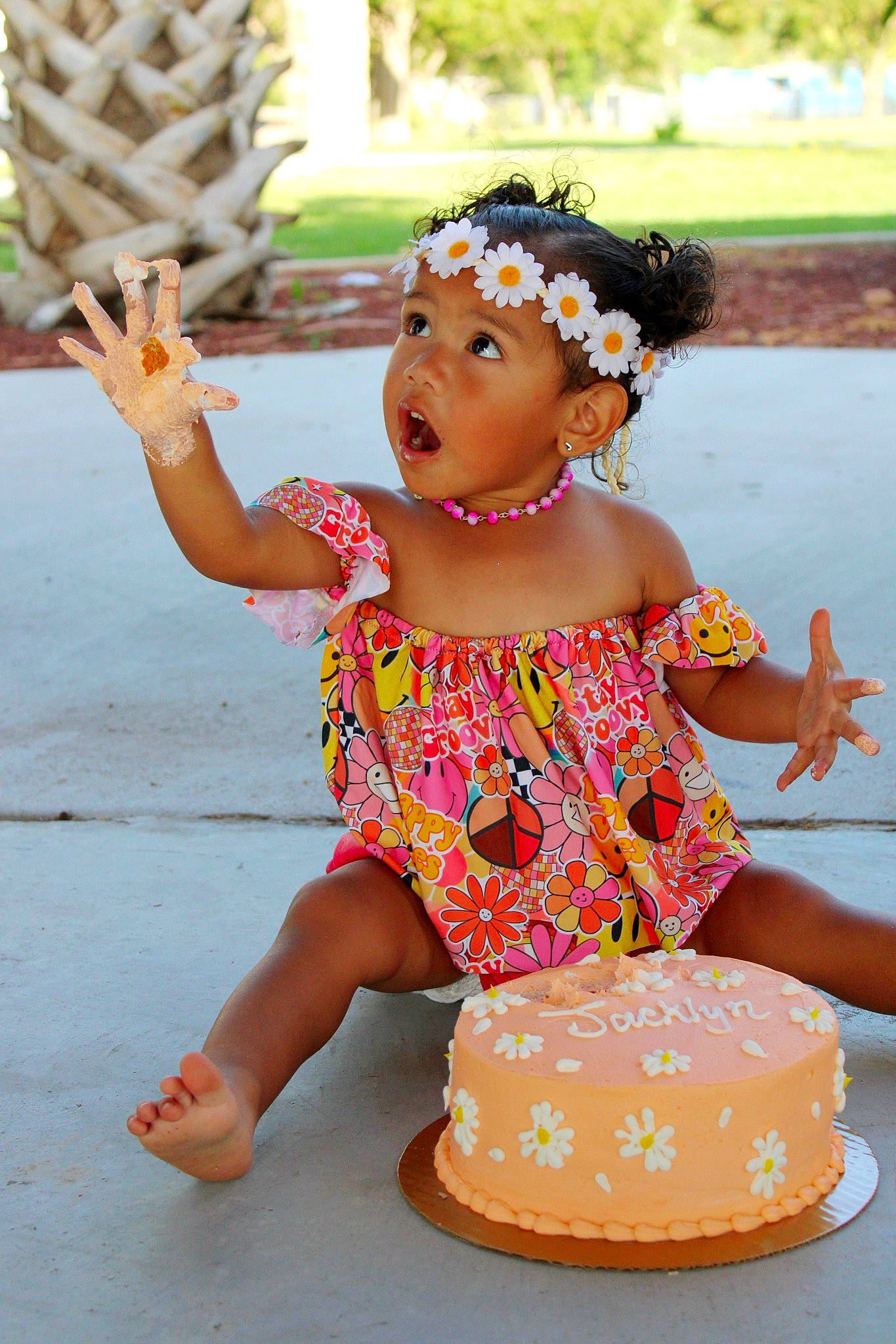 Jacklyn is registered to the contest to win money with this photo: birthday_cake, cake, cake_decorating, cake_decorating_supply, dessert, dress, event, face, food, fun, happy, headwear, icing, leisure, orange, person, pink, recreation, sugar_cake, summer