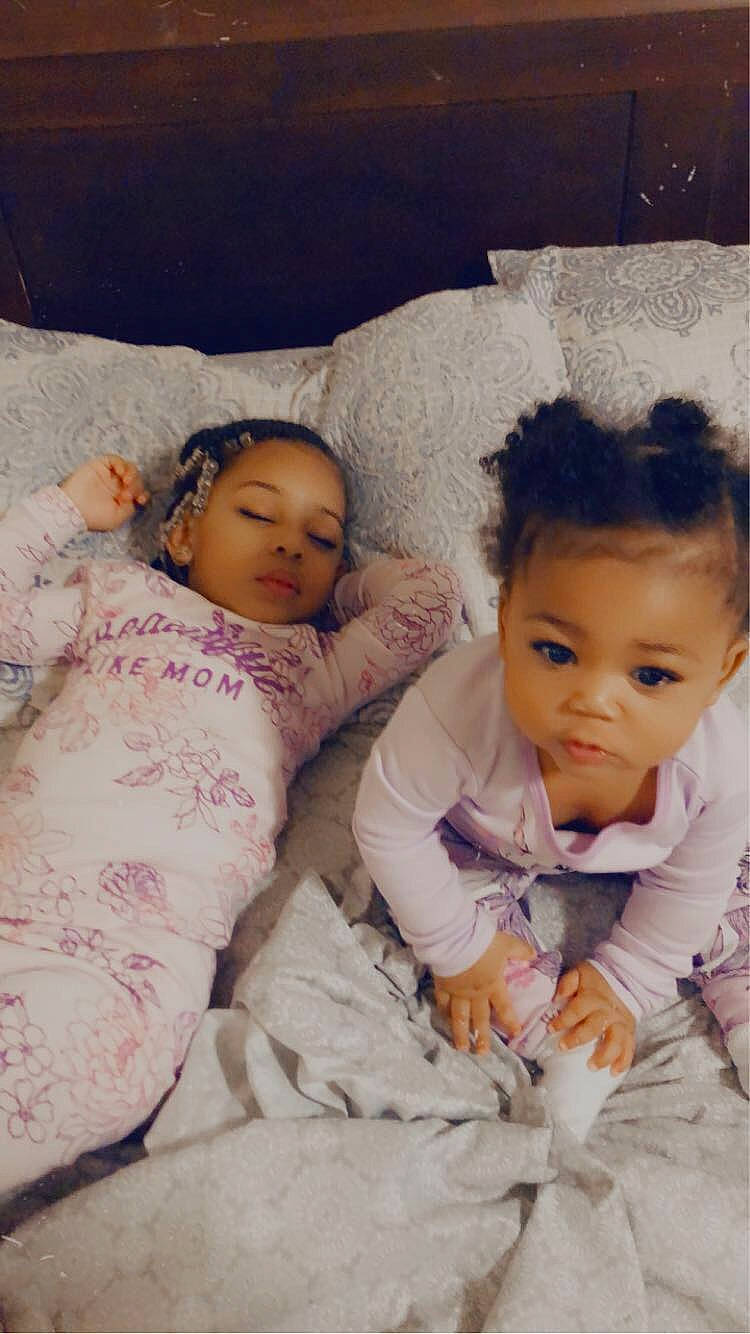 Malayah is registered to the contest to win money with this photo: baby_toddler_clothing, cheek, comfort, face, facial_expression, fun, gesture, hairstyle, hand, happy, head, human_body, iris, lip, nose, organ, person, skin, sleeve, textile