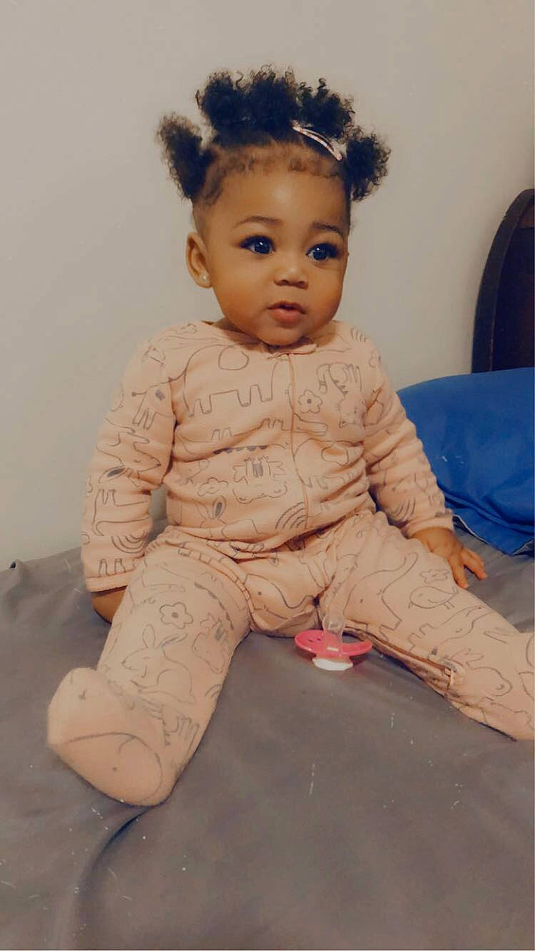 Malayah is registered to the contest to win money with this photo: baby, baby_toddler_clothing, cheek, chin, dress, eye, eyebrow, eyelash, flooring, forehead, hairstyle, head, human_body, iris, lip, nose, person, shoulder, skin, sleeve