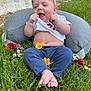 baby, child, grass, flowers, smiling, shirt, blue_pants, barefoot, outdoor, greenery, cushion, playful, happy, nature, infant, cute, person, sitting, summer, joyful